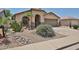 Charming single-story home with desert landscaping, a two-car garage, and a well-maintained exterior at 16126 N 159Th Dr, Surprise, AZ 85374