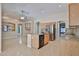 Open floor plan showcasing the kitchen and living area with modern finishes at 16126 N 159Th Dr, Surprise, AZ 85374