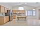 Updated kitchen featuring granite countertops, stainless appliances and a breakfast nook at 16126 N 159Th Dr, Surprise, AZ 85374