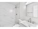 Modern bathroom featuring marble tiling in shower, white vanity and a sleek mirror at 1631 E Newport Dr, Tempe, AZ 85282