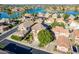 Beautiful aerial view of a home with a lush green yard and solar panels at 16425 S 34Th St, Phoenix, AZ 85048