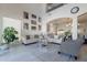 Open concept living room showcasing vaulted ceilings, neutral tones, and seamless flow to the kitchen at 16425 S 34Th St, Phoenix, AZ 85048