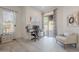 Bright office space with a sliding glass door to the backyard and patio at 16425 S 34Th St, Phoenix, AZ 85048