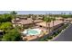 Overhead view of a home's backyard pool area, perfect for relaxation and entertaining at 1643 N 144Th Dr, Goodyear, AZ 85395