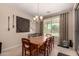 Comfortable dining room area with natural lighting and stylish decor at 1643 N 144Th Dr, Goodyear, AZ 85395