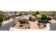 Charming home with well-manicured landscaping, stone accents, and a welcoming entrance at 1643 N 144Th Dr, Goodyear, AZ 85395