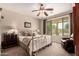 Inviting main bedroom with neutral tones and a comfortable layout at 1643 N 144Th Dr, Goodyear, AZ 85395