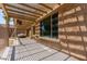Covered patio with outdoor kitchen and view of pool at 1643 N 144Th Dr, Goodyear, AZ 85395