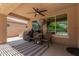 Comfortable patio includes seating, grill, fan and view of pool at 1643 N 144Th Dr, Goodyear, AZ 85395