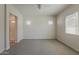 Spacious main bedroom with neutral tones, carpet flooring, and natural light at 16836 W Vereda Solana Dr, Surprise, AZ 85387