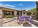 Charming backyard featuring an outdoor seating area with fountain, offering a serene and inviting space at 1721 W Kingbird Dr, Chandler, AZ 85286