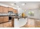 Bright kitchen featuring an island, modern appliances, and stylish countertops at 1721 W Kingbird Dr, Chandler, AZ 85286