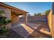View of covered patio with pavers at 18344 W Getty Dr, Goodyear, AZ 85338