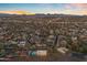 City view from a high vantage point showcasing a sprawling residential area with twinkling lights at night at 1917 E Karen Dr, Phoenix, AZ 85022