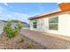 Backyard view showcasing brick paver patio, green tree and views of the rest of the yard at 1917 E Karen Dr, Phoenix, AZ 85022