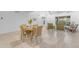Dining room with light wood floors and modern furnishings and decor at 1917 E Karen Dr, Phoenix, AZ 85022