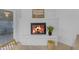 Close up on modern fireplace with white brick and hearth at 1917 E Karen Dr, Phoenix, AZ 85022