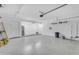 Large two car garage with overhead lighting and door with opener at 1917 E Karen Dr, Phoenix, AZ 85022