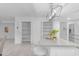 Bright kitchen features island seating, stainless steel appliances and lots of pantry space at 1917 E Karen Dr, Phoenix, AZ 85022