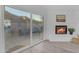 Living room features sliding glass doors to the exterior and a fireplace at 1917 E Karen Dr, Phoenix, AZ 85022