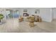 Bright living room featuring white brick fireplace, wood flooring, and modern furnishings at 1917 E Karen Dr, Phoenix, AZ 85022