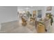 Bright living room featuring wood flooring, white walls, and modern furnishings at 1917 E Karen Dr, Phoenix, AZ 85022