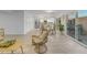 Open living room next to kitchen with light colored wood flooring at 1917 E Karen Dr, Phoenix, AZ 85022