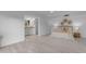 Spacious primary bedroom with wood-look tile flooring leading to ensuite bathroom at 1917 E Karen Dr, Phoenix, AZ 85022