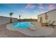 Backyard pool with lounge chairs, landscaping, diving board and mountain views at 1917 E Karen Dr, Phoenix, AZ 85022