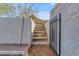 Landscaped stairway with handrail leading up hillside at 1917 E Karen Dr, Phoenix, AZ 85022