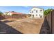 Property featuring a spacious backyard, perfect for outdoor activities at 2112 S 160Th Dr, Goodyear, AZ 85338