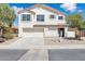 Charming two-story home with a two car garage and low-maintenance landscaping at 2112 S 160Th Dr, Goodyear, AZ 85338