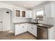 Updated kitchen featuring granite countertops, white cabinets, and stainless steel appliances at 2112 S 160Th Dr, Goodyear, AZ 85338