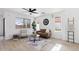 Inviting living room showcasing a comfortable seating arrangement and bright airy windows at 2112 S 160Th Dr, Goodyear, AZ 85338