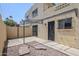 Enclosed backyard with a rock garden and covered patio providing ample shade at 2223 E Catalina Dr, Phoenix, AZ 85016