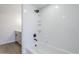 This bathroom boasts a tiled shower, updated fixtures, and vanity with modern finishes at 2223 E Catalina Dr, Phoenix, AZ 85016