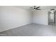 Spacious bedroom featuring modern ceiling fan and neutral color palette at 2223 E Catalina Dr, Phoenix, AZ 85016