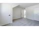 Bright bedroom featuring neutral walls and plush carpeting, offering a serene and inviting space at 2223 E Catalina Dr, Phoenix, AZ 85016