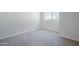 Bright bedroom featuring neutral carpet and paint at 2223 E Catalina Dr, Phoenix, AZ 85016