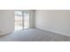 The bedroom has sliding glass doors to access the outside patio at 2223 E Catalina Dr, Phoenix, AZ 85016