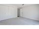 This spacious bedroom features plush carpeting and ample closet space at 2223 E Catalina Dr, Phoenix, AZ 85016