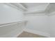 Walk-in closet featuring ample shelving and storage space at 2223 E Catalina Dr, Phoenix, AZ 85016