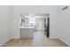 This remodeled kitchen has stainless steel appliances, gray cabinets, skylight and a door to the backyard at 2223 E Catalina Dr, Phoenix, AZ 85016