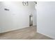 The living room features vaulted ceilings and new hardwood floors, creating an open, airy space at 2223 E Catalina Dr, Phoenix, AZ 85016