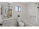 Bathroom features a granite sink and countertop with a window view of the outdoors at 2455 E Broadway Rd # 122, Mesa, AZ 85204