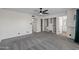 Bedroom features white walls, neutral carpeting, and an open closet layout at 2455 E Broadway Rd # 122, Mesa, AZ 85204
