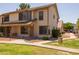 Attractive home with well-maintained lawn, tidy landscaping, and convenient carport at 2455 E Broadway Rd # 122, Mesa, AZ 85204