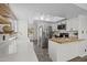 Updated kitchen with stainless steel appliances, butcher block counters, and neutral paint tones at 2455 E Broadway Rd # 122, Mesa, AZ 85204