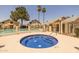 Community hot tub featuring decorative blue tiles at 2455 E Broadway Rd # 122, Mesa, AZ 85204