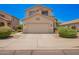 Well-maintained two-story home with a clean front yard and attached two-car garage at 25210 N 40Th Ave, Phoenix, AZ 85083